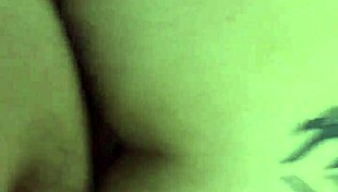 colombian crossdresser in doggystyle pose on sofa