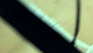 colombian crossdresser in doggystyle pose on sofa