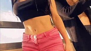 Sasha Rose is dancing this sexy striptease, teasing everyone around.