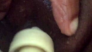 Ebony Squirts Passionately on Sofa