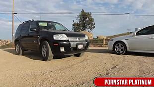 Samantha Rone tends to Mindi Mink's bushy pussy outdoors