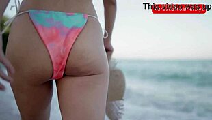 Hey, isn't this sexy Asian in a bikini walking on the beach just mesmerizing?