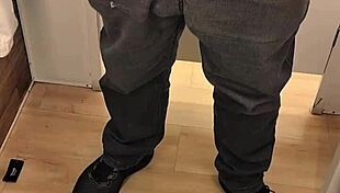 He asks, 'Want a quick handjob in the mall bathroom?' as he jerks his small cock.