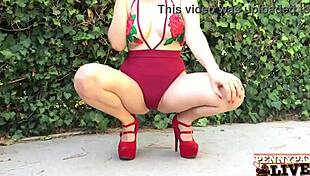 naughty penny pax plays with her double-head dildo outside