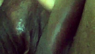 Ebony Squirts Passionately on Sofa