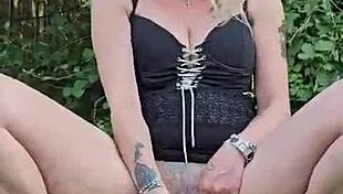 Suggestive masturbation session happening outdoors, teasing with every touch.