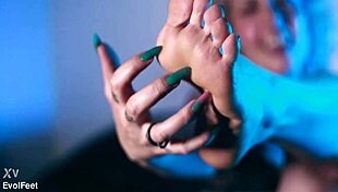 Gorgeous Marilou worships feet and masturbates with the queen.