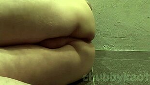 Chubbykaot on the floor with a dildo in public