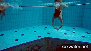 Milana And Katrin Strip Each Other Underwater In Pool