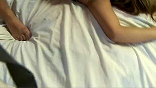 This slutty teen sucks balls while bent over in lingerie