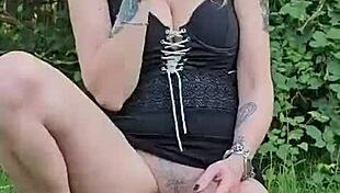 Suggestive masturbation session happening outdoors, teasing with every touch.