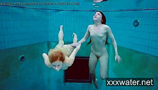 Milana And Katrin Strip Each Other Underwater In Pool