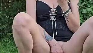 Suggestive masturbation session happening outdoors, teasing with every touch.