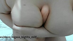 whoa, check out this curvy latina with big tits spitting on them for a wild titty fuck session using toys