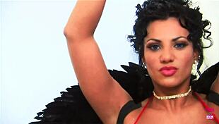 A brunette bimbo with huge fake tits gets deepthroat and doggystyle pounding in vintage lingerie