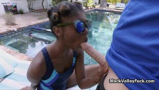 Nubian Princess Suggestively Blows Big White Dick By The Pool.