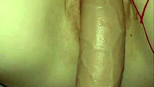 Soft petite redhead uses monster toy in bedroom close-up