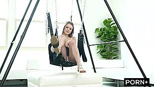 Walking fuck doll strapped to swing and fucked