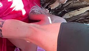 Intimate scene with sex toy outdoors.