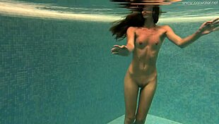 I show my petite tits and tight pussy underwater