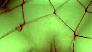 Soft petite redhead uses monster toy in bedroom close-up