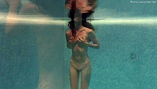 I show my petite tits and tight pussy underwater