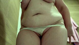 Mature bbw pisses on pussy in white panties at pool from below