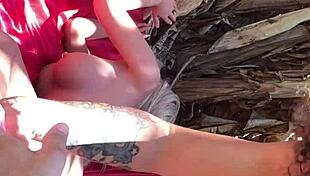 Intimate scene with sex toy outdoors.