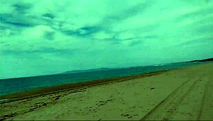 Guy Spills Milk on Nude Beach Accident. Lots of Spillage and Beach Fun.