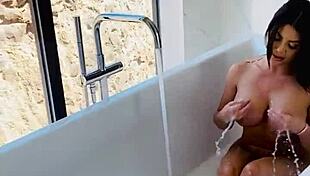 Savannah Storm Masturbates In The Tub With A View As She Fucks Her Big Ass And Tits With Glass Dildo.