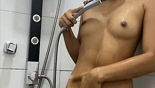 Cute teen masturbates in horny shower