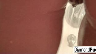 Diamond Chooses to Splash Around Playfully in the Shower, Enjoying the Water and Fun