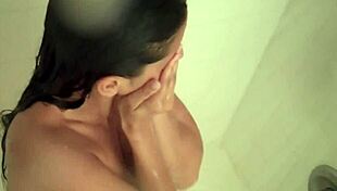 Diamond Chooses to Splash Around Playfully in the Shower, Enjoying the Water and Fun