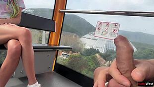 Huge brunette amateur jerks cock and swallows cum on ferris wheel in public forest