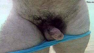 Uncle relaxes naked on the sunny beach