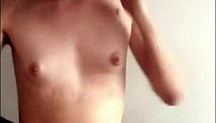 Cute transsexual girl moans during solo masturbation, reaching orgasm