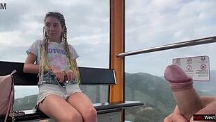 Huge brunette amateur jerks cock and swallows cum on ferris wheel in public forest