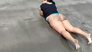 Oh wow, this chubby Latina with that massive ass on the beach, she's curvy and tattooed, making me so hot...