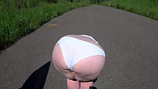 Girlfriend strap-on fucks milf's fat ass outdoors