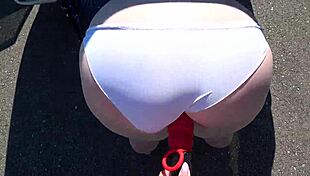 Girlfriend strap-on fucks milf's fat ass outdoors