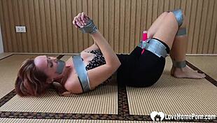 Using tape and vibrator to please her