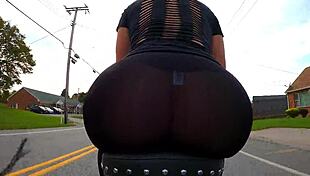 brunette milf shows big ass on motorcycle