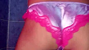 Mexican model dances seductively in satin lingerie and pantyhose