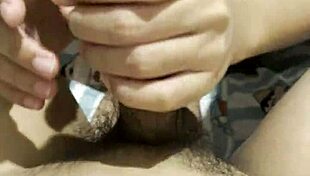 this cute asian girl surprises her boyfriend with a slow teasing handjob in their cozy bedroom