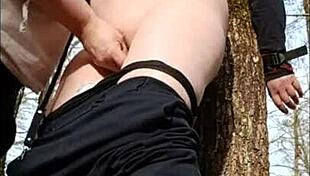 Slave in forest bondage and submission