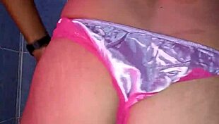 Mexican model dances seductively in satin lingerie and pantyhose