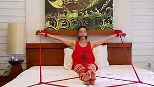 Sofi Tied Up In Red Ropes On Bed For Bondage Session Part 2
