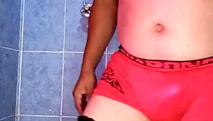 Mexican model dances seductively in satin lingerie and pantyhose