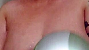 Big boobs glistening in the shower