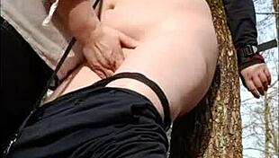 Slave in forest bondage and submission